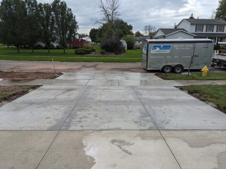 Completed broomed concrete driveway with control joints