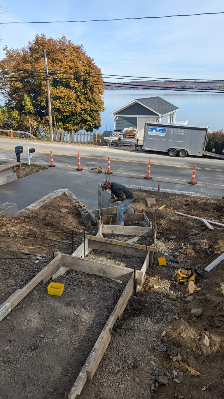 Wooden concrete forms for steps and sidewalk at waterfront property