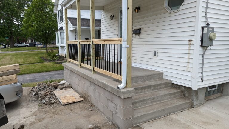 Classic broomed concrete stoop and sidewalk