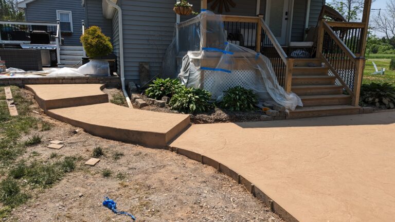 Colored concrete walkway with steps