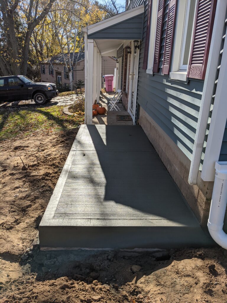 Flat broomed concrete front sidewalk