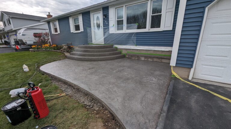 Front stamped concrete patio and stoop