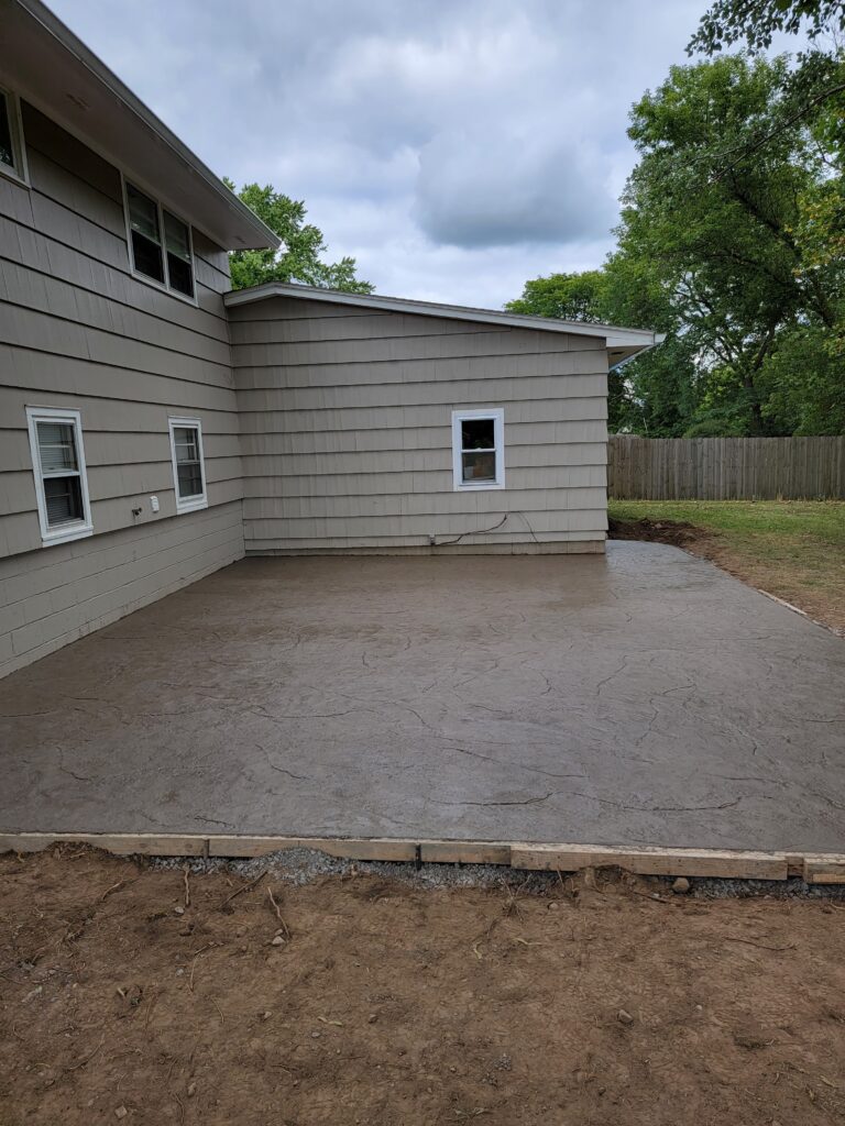 Stamped concrete backyard patio